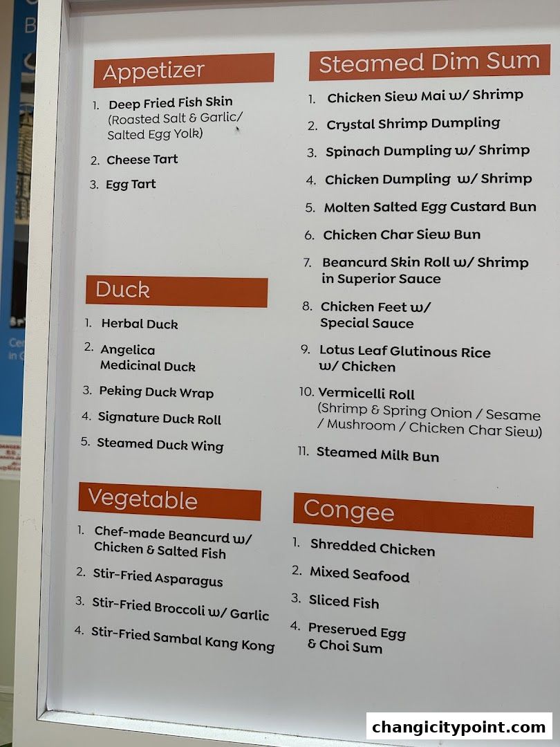 A menu board displaying various dim sum, duck, vegetable, and congee dishes.