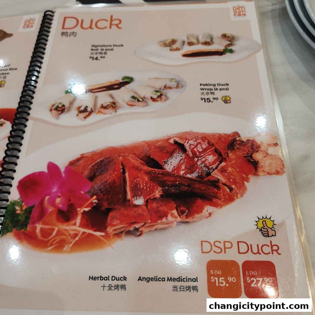 A menu page showcasing various duck dishes with prices and images.