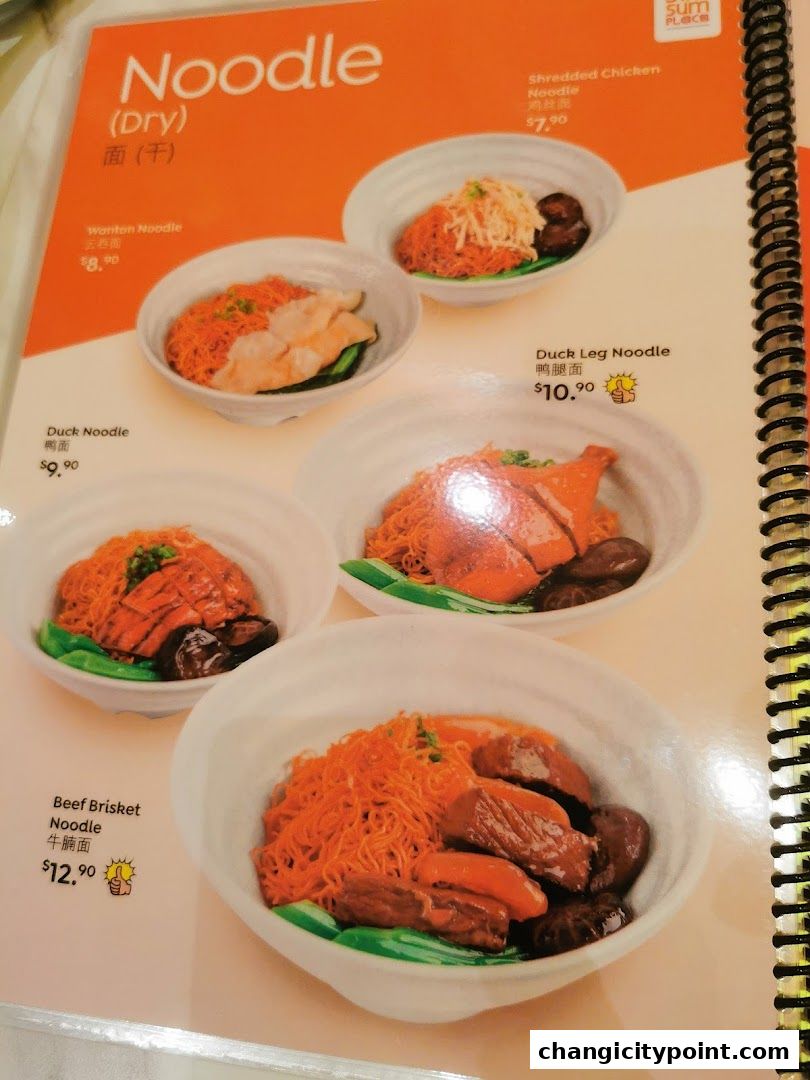 A menu page showcasing various dry noodle dishes with appetizing images.