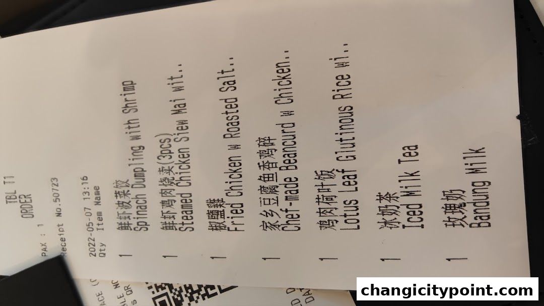 A receipt from The Dim Sum Place listing various dim sum items and drinks.