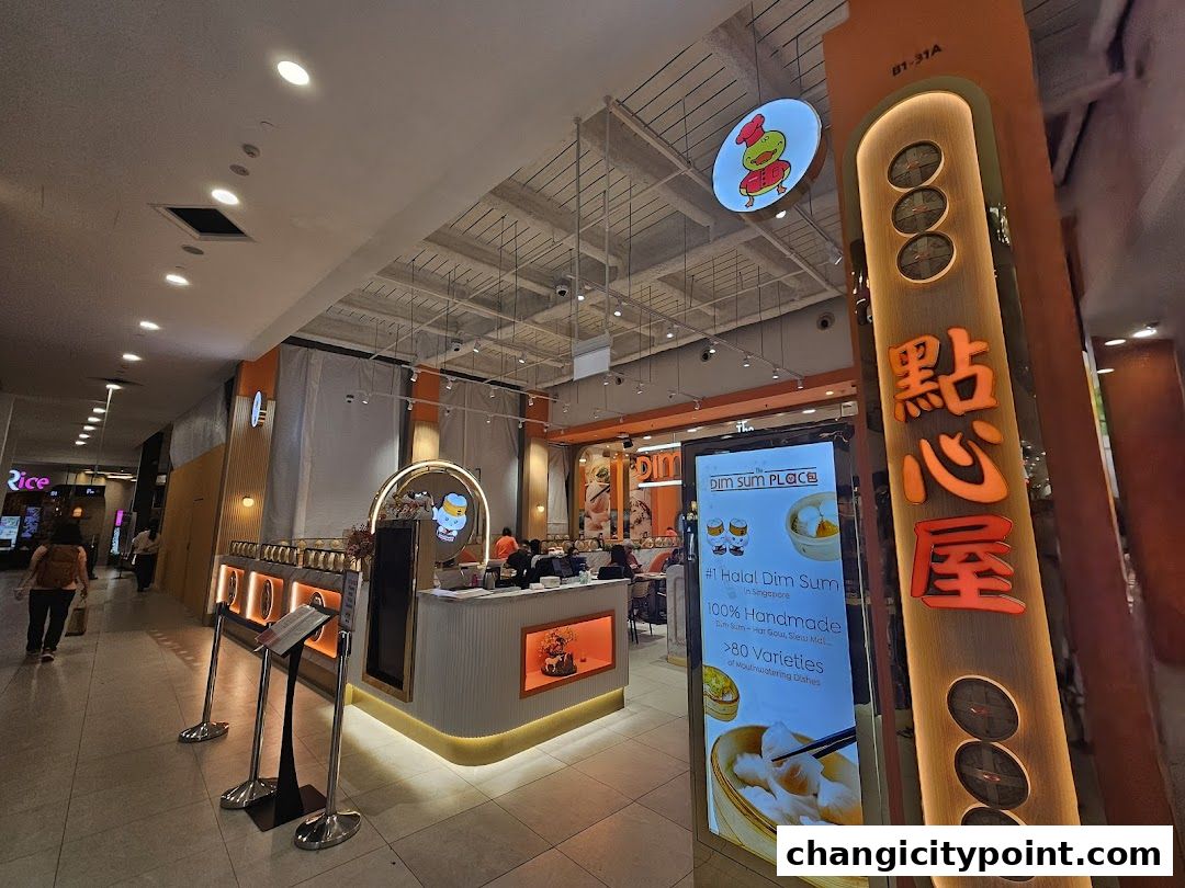 The Dim Sum Place restaurant entrance with a digital menu board and signage.