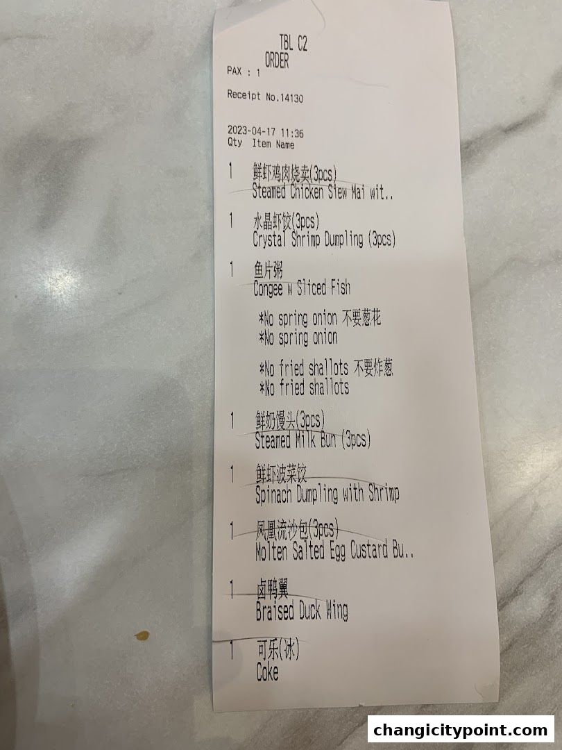 A receipt from The Dim Sum Place showing a list of ordered dim sum items and drinks.