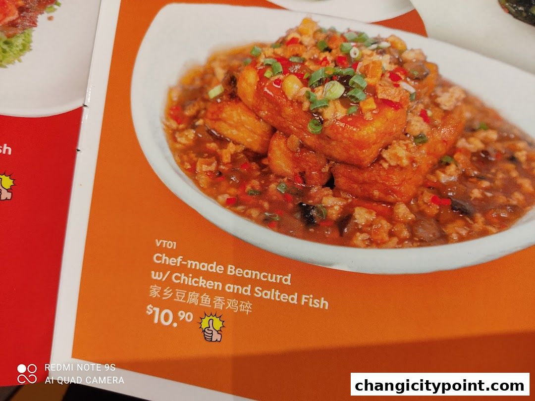 A close-up of a menu item: Chef-made Beancurd with Chicken and Salted Fish.