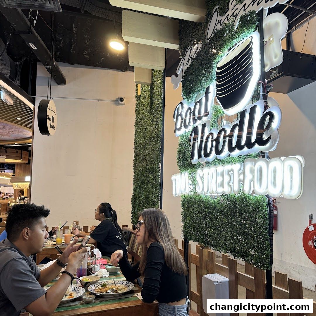 Diners enjoy Thai street food at The Original Boat Noodle restaurant.