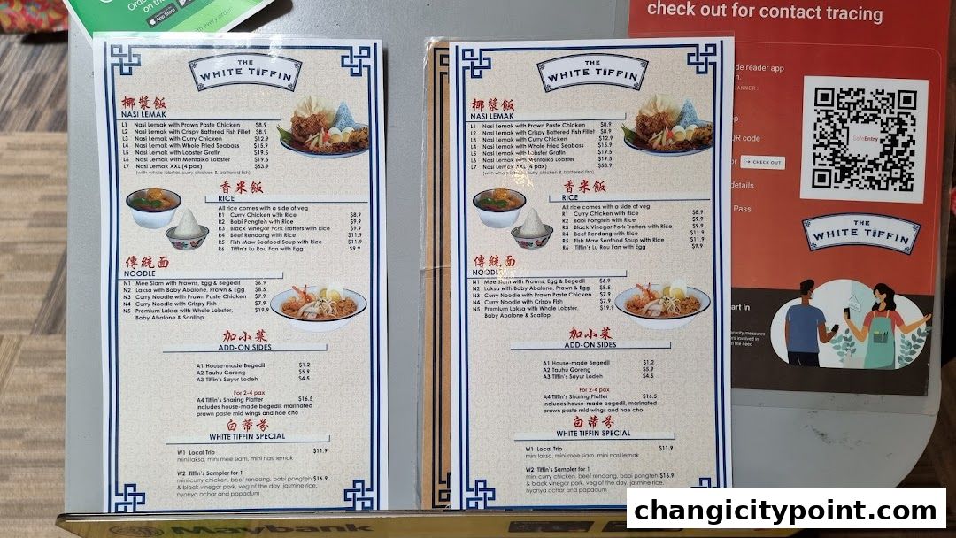 A menu for The White Tiffin restaurant, featuring Nasi Lemak, Rice, Noodles, and specials.