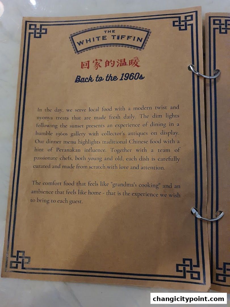 A menu page for The White Tiffin, featuring a description of their food and ambiance.