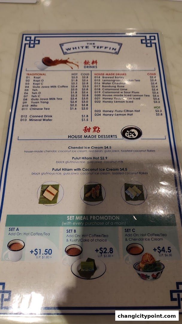 A menu from The White Tiffin featuring drinks, desserts, and set meal promotions.