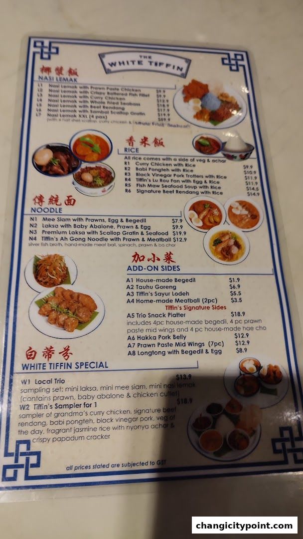 A menu from The White Tiffin featuring Nasi Lemak, Rice dishes, Noodles, Add-on Sides, and Specials.