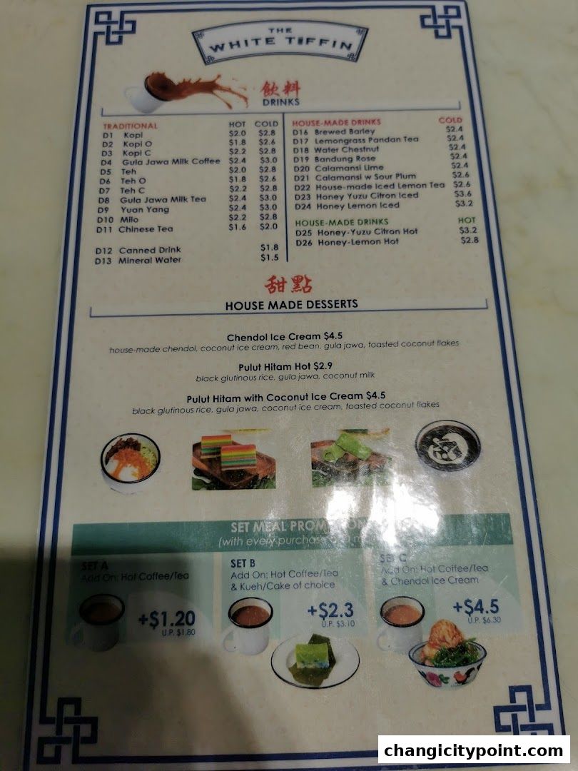 A menu from The White Tiffin featuring drinks, desserts, and set meal promotions.