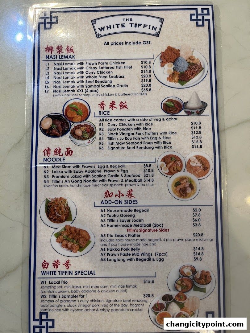 A menu from The White Tiffin featuring Nasi Lemak, Rice dishes, Noodles, Add-on Sides, and Specials.