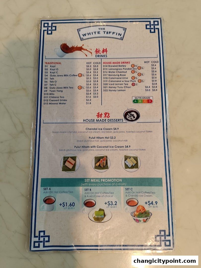 A menu from The White Tiffin featuring drinks, desserts, and set meal promotions.