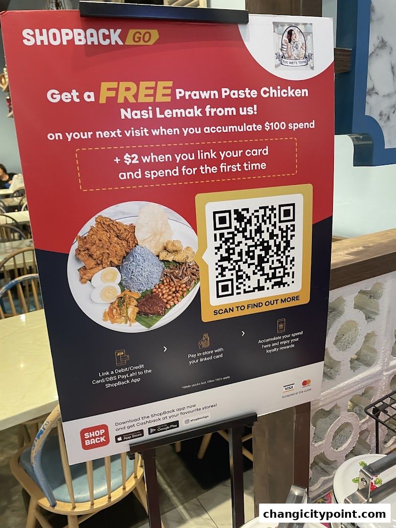 A promotional sign for Shopback Go offering a free Prawn Paste Chicken Nasi Lemak.