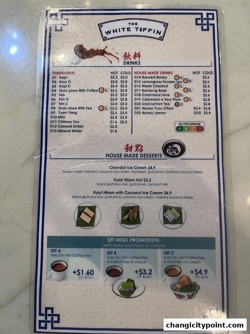 A menu from The White Tiffin featuring drinks, desserts, and set meal promotions.