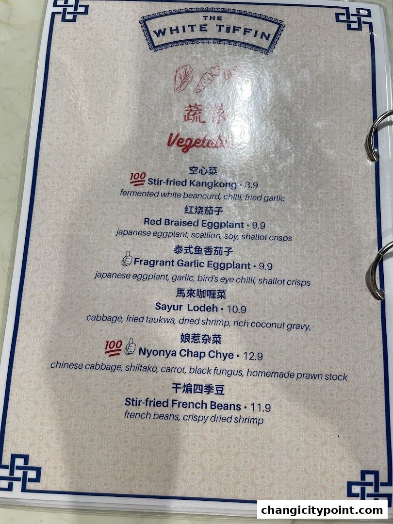 A menu page from The White Tiffin featuring a selection of vegetable dishes with prices.