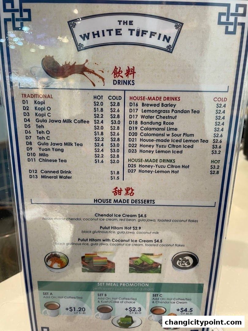 A menu from The White Tiffin featuring drinks and desserts with prices.