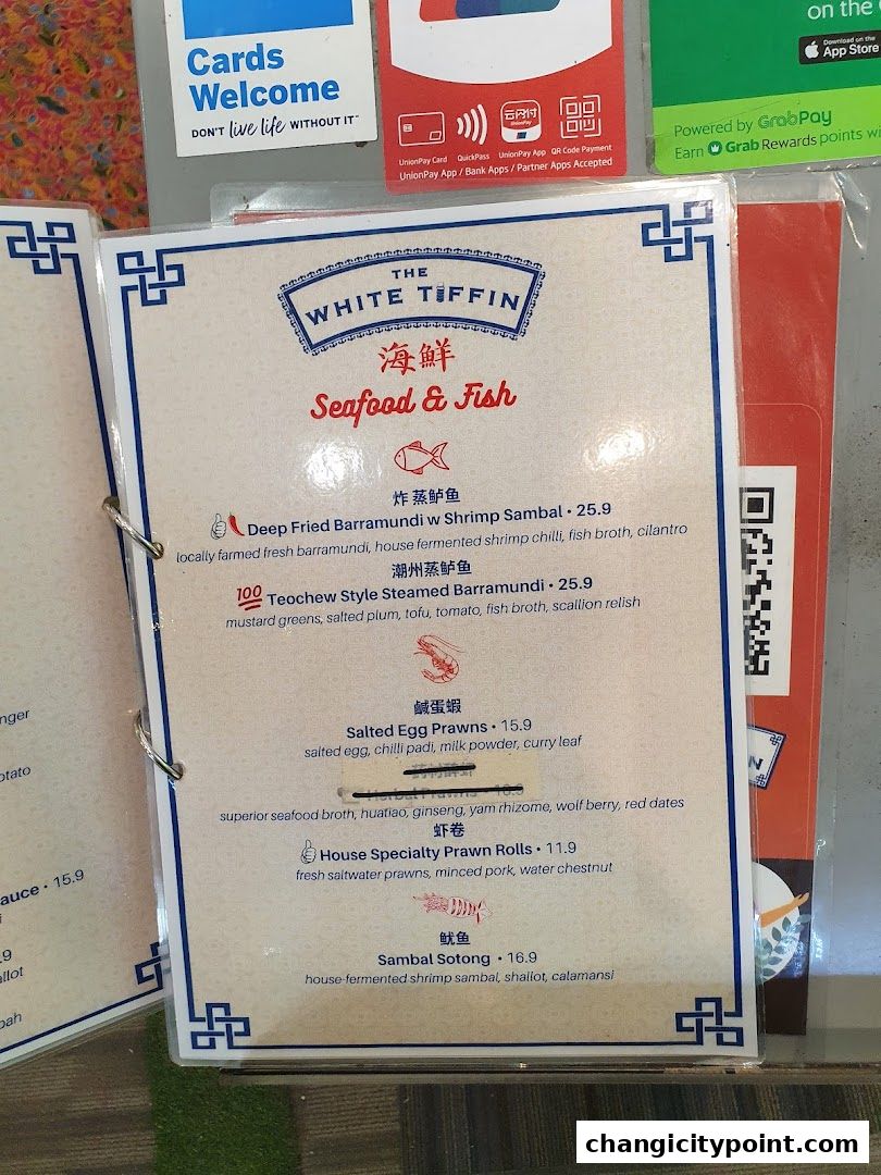 A menu from The White Tiffin featuring seafood and fish dishes.