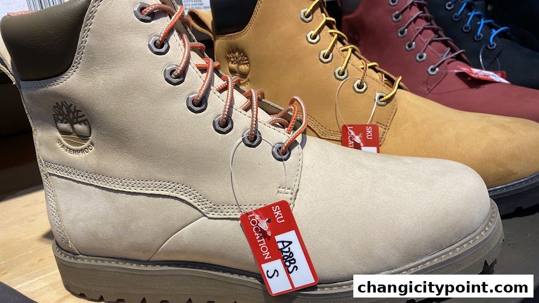 Close-up of several Timberland boots in various colors, showcasing their iconic design.