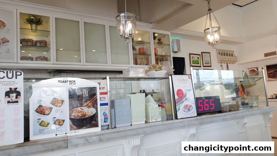 Toast Box Changi City Point counter displaying food items and prices.