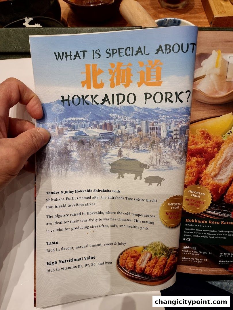 A menu page detailing Hokkaido pork and a Hokkaido Rosu Katsu set.