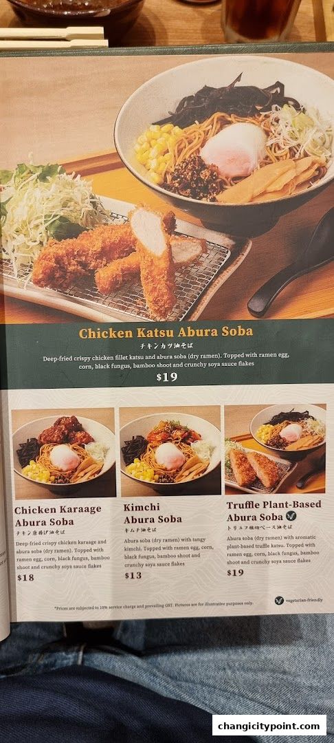 A menu featuring various Abura Soba dishes with chicken katsu, karaage, kimchi, and truffle plant-based options.