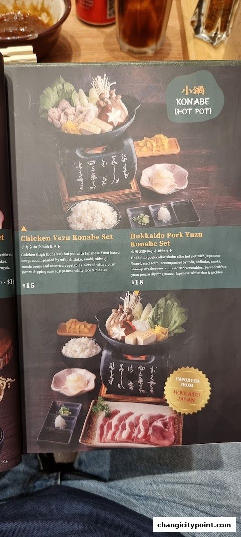 A menu page showcasing two Konabe hot pot sets: Chicken Yuzu and Hokkaido Pork Yuzu.