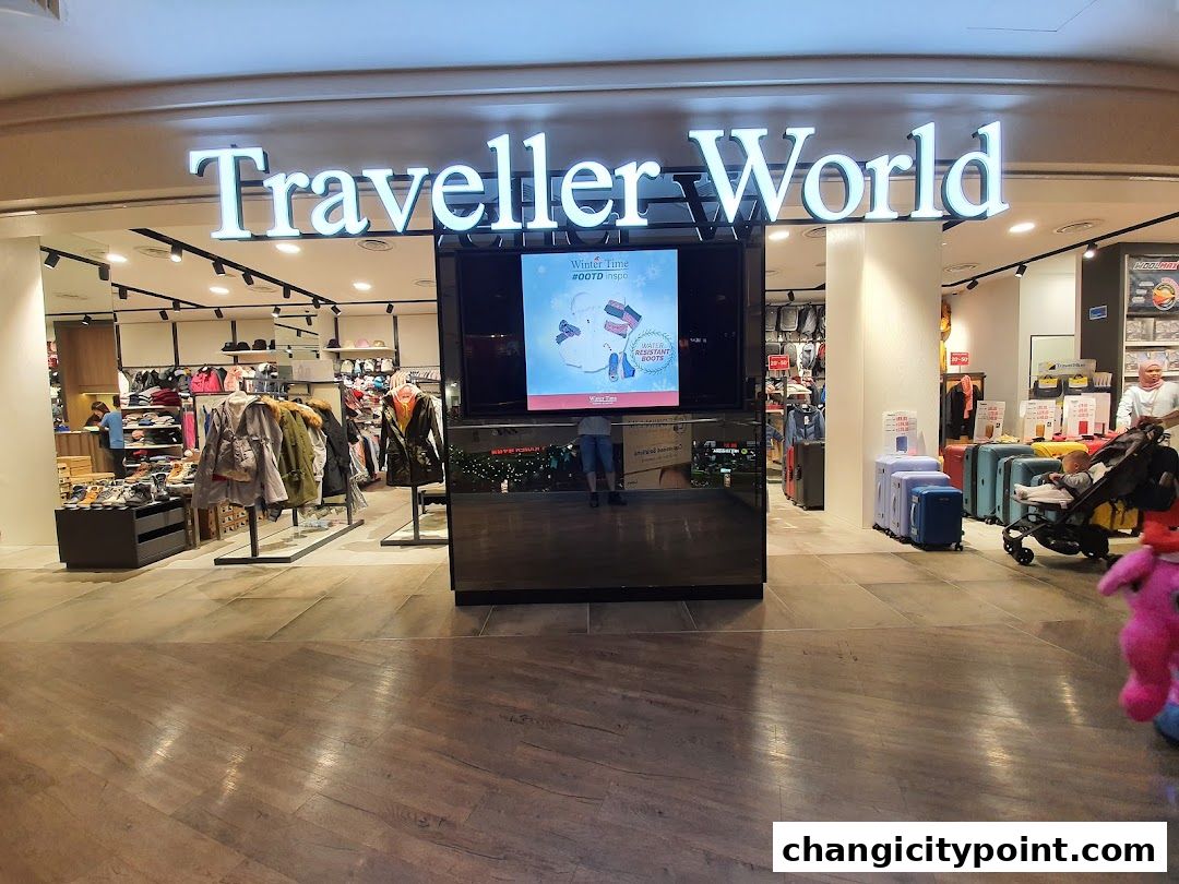 Traveller World shop front displaying luggage, apparel, and footwear.