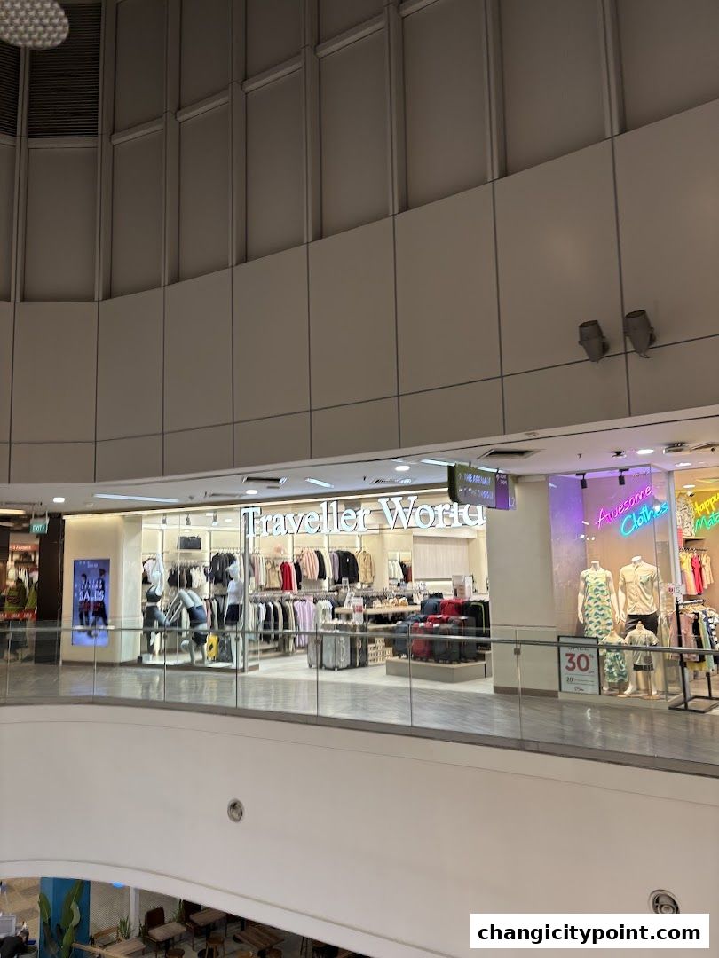 Traveller World shop entrance with clothing and luggage displays.