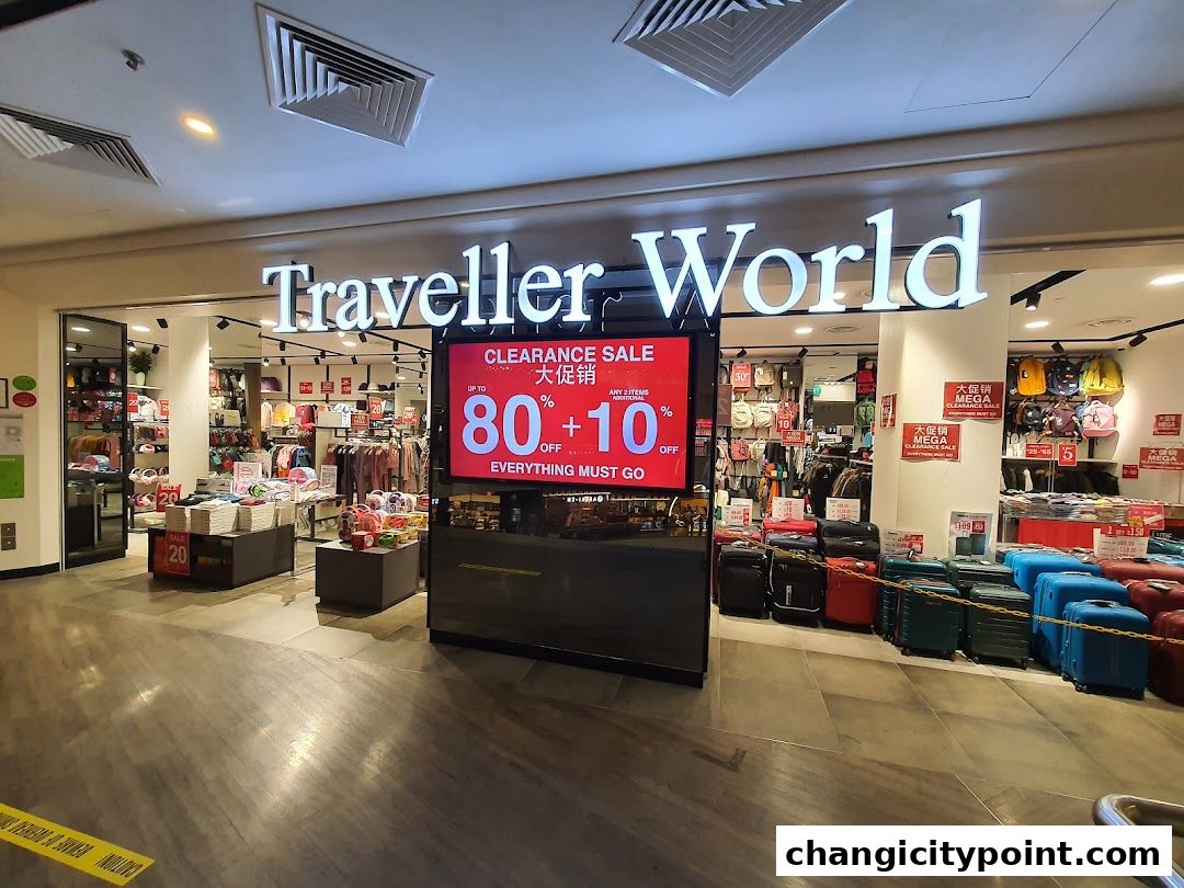 Traveller World shop front with a large clearance sale display and luggage.