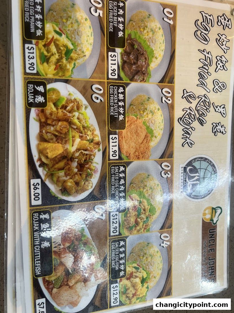 A menu from Uncle John's Makan Place featuring various egg fried rice dishes and rojak.