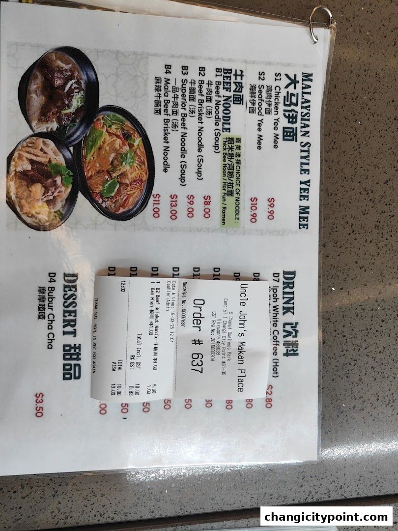 A menu from Uncle John's Makan Place featuring Malaysian style Yee Mee and Beef Noodles.
