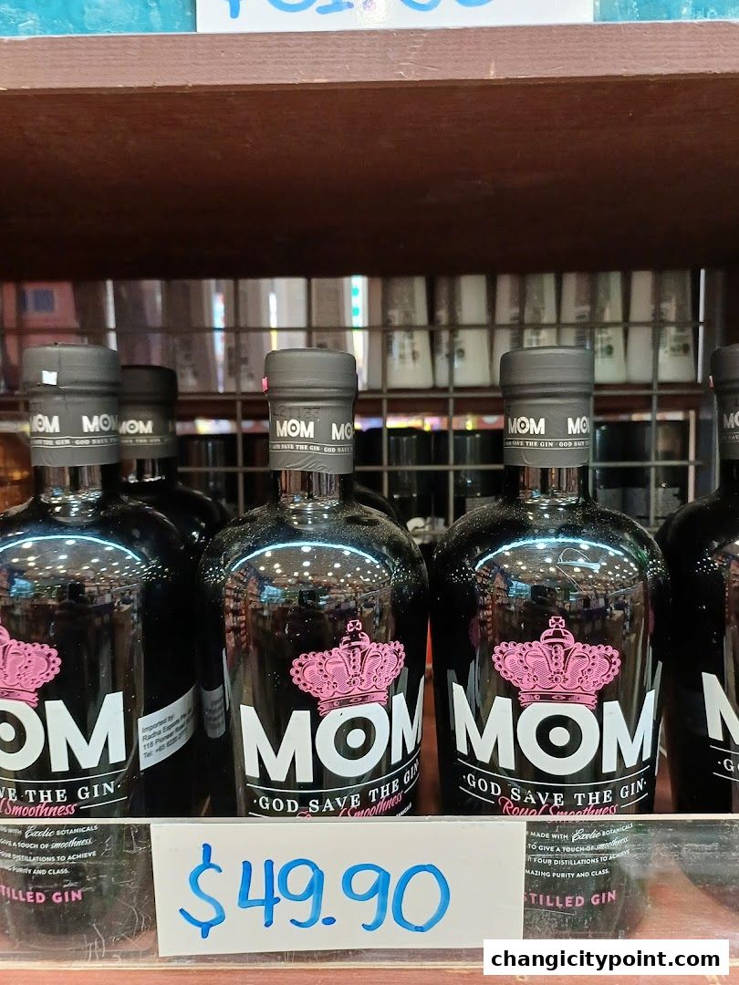 Bottles of MOM gin are displayed on a shelf with a price tag of $49.90.