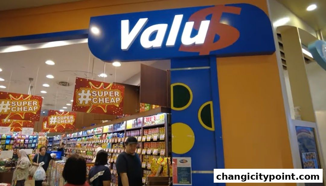 The entrance of a Valu store with 'Super Cheap' signs and shelves stocked with products.