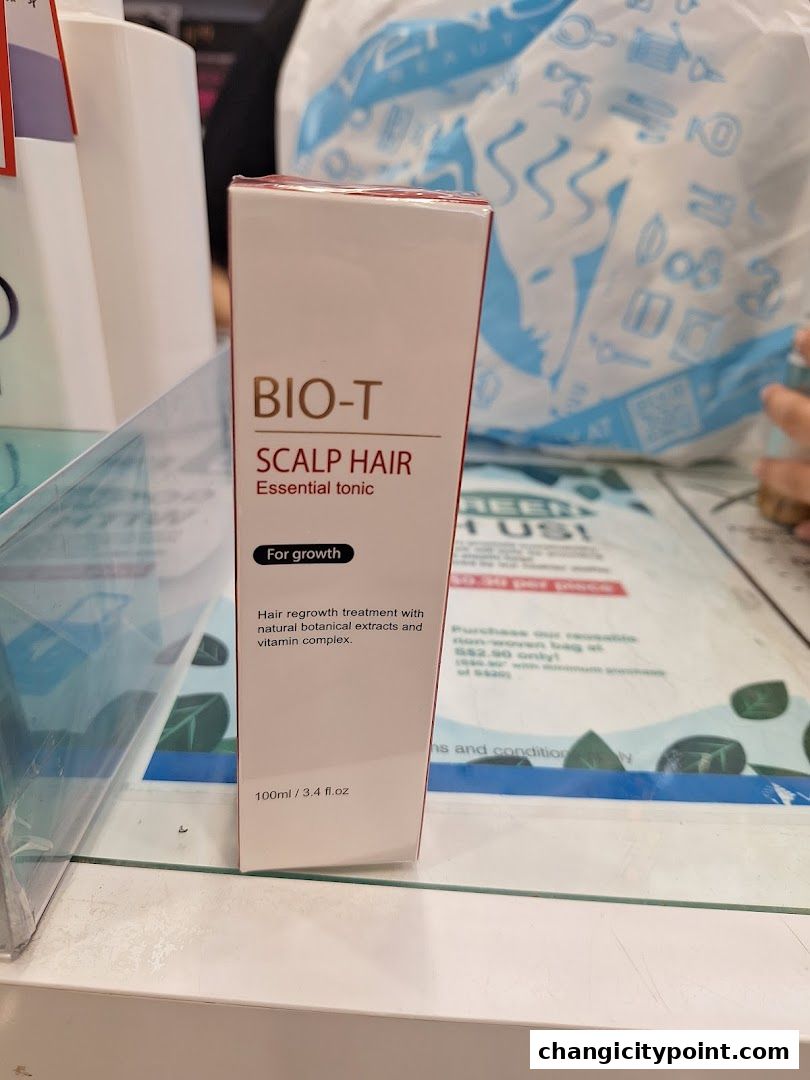 A box of BIO-T Scalp Hair Essential tonic for hair regrowth treatment.