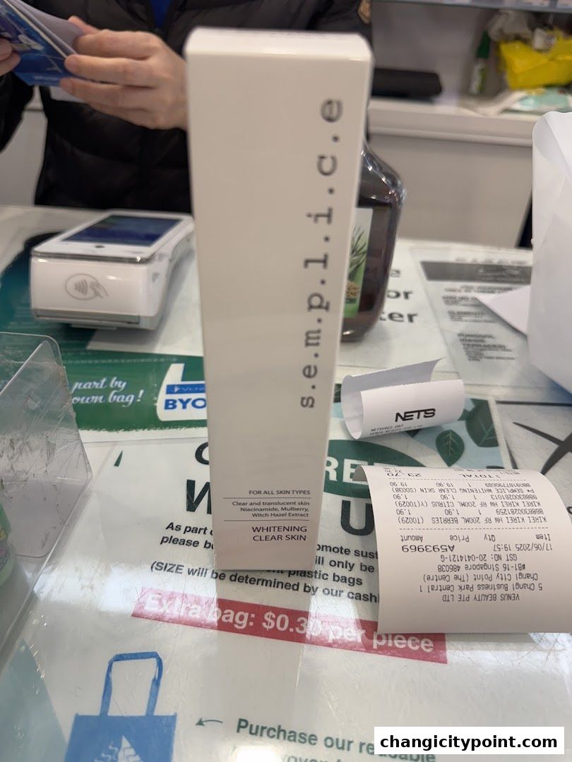 A close-up of a product box and receipt from Venus Beauty Changi City Point.