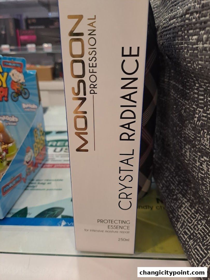 A box of Monsoon Professional Crystal Radiance Protecting Essence for intensive moisture repair.