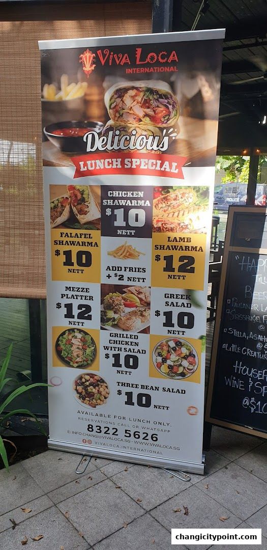 A Viva Loca International lunch special banner showcasing shawarma, salads, and platters.