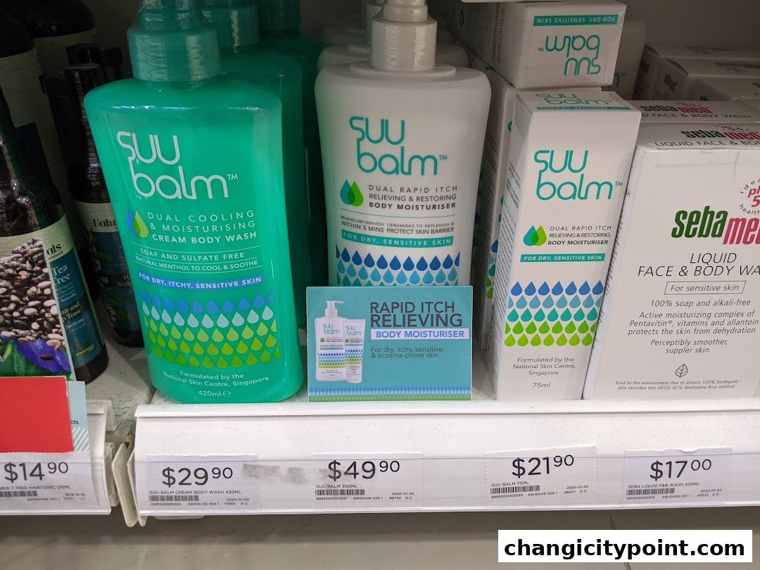 A display of Suu Balm and Sebamed skincare products, including body washes and moisturisers.