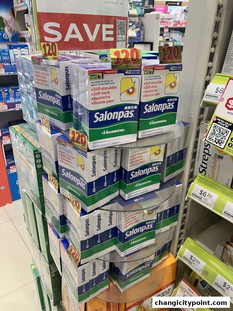 A display of Salonpas pain relief patches with a 'SAVE 120' sign.