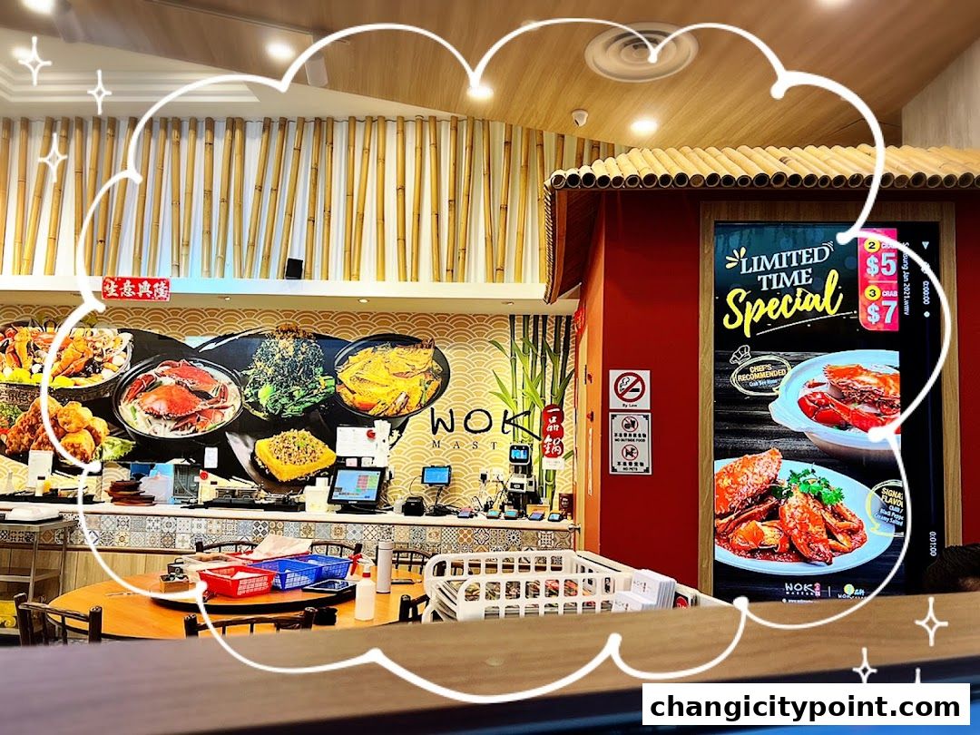 Interior of Wok Master Changi City Point with food displays and a limited-time special offer.