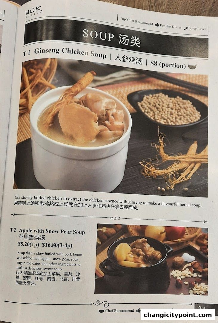 A menu page from Wok Master featuring two soup dishes: Ginseng Chicken Soup and Apple with Snow Pear Soup.