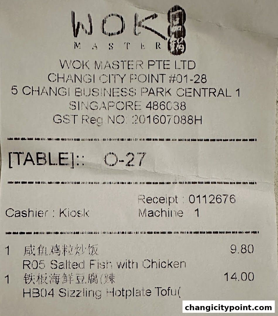 A receipt from Wok Master showing food items and prices.