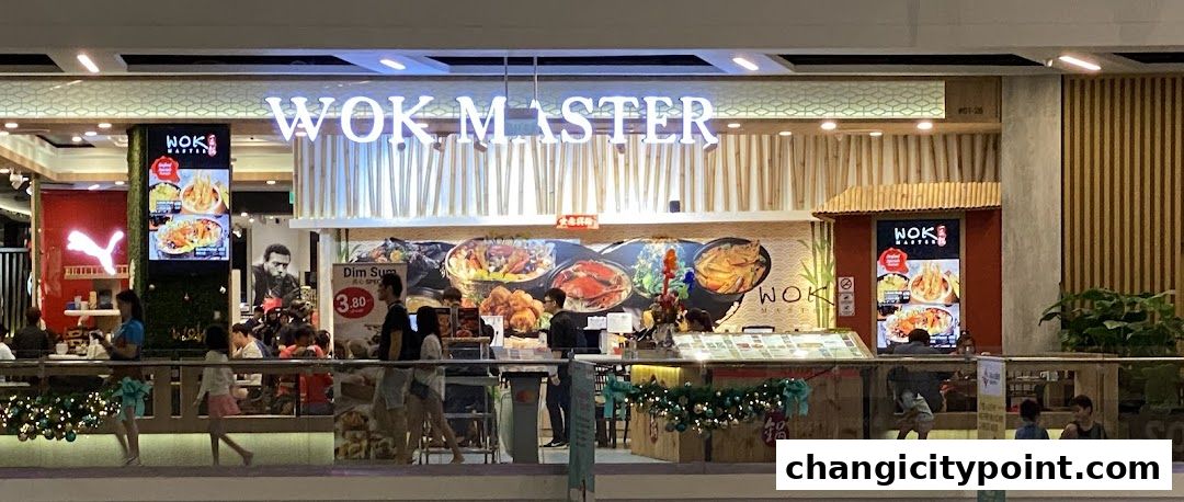 The exterior of Wok Master restaurant with its signage and food displays.