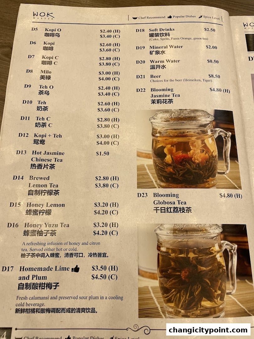 A menu from Wok Master Changi City Point featuring drinks like Kopi, Teh, and specialty teas.