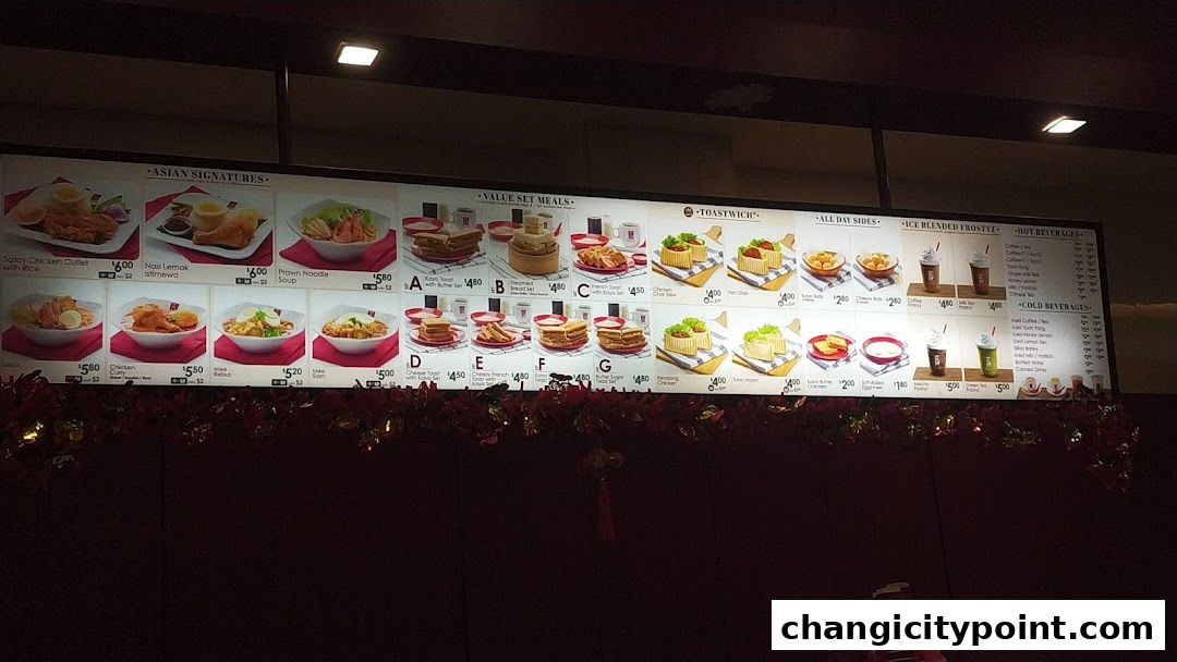 A brightly lit menu board displaying various Asian signatures, set meals, toastwiches, sides, and beverages.