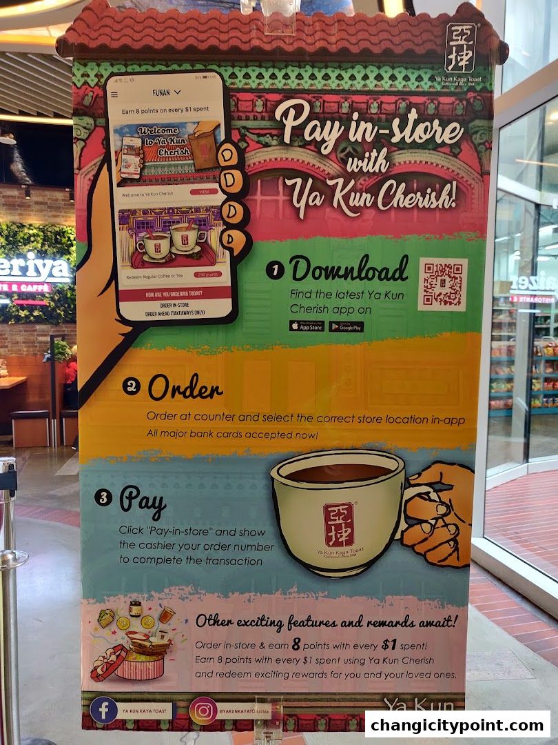 A promotional banner for Ya Kun Kaya Toast's 'Cherish' app and in-store payment system.