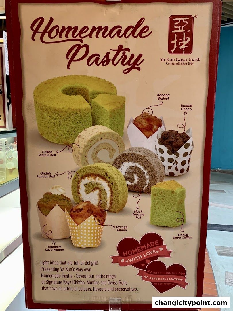 A display of Ya Kun Kaya Toast's homemade pastries, including rolls, muffins, and chiffon cakes.