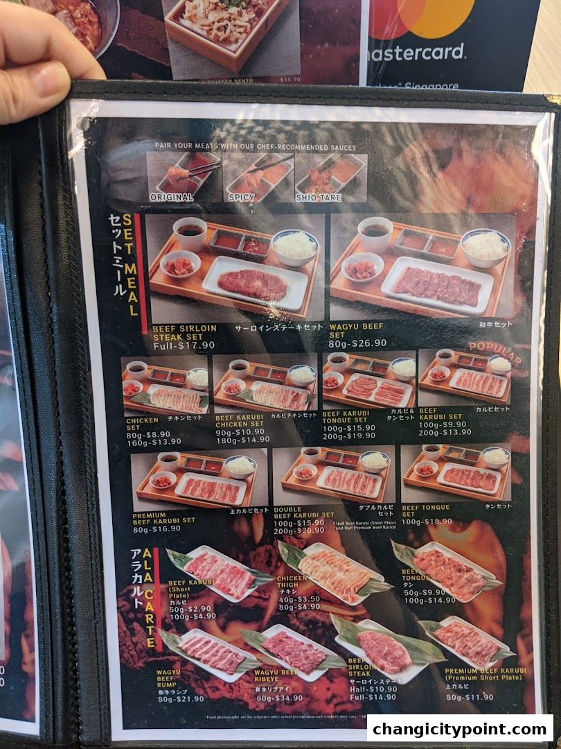 A menu page displaying various Japanese yakiniku set meals and a la carte options.