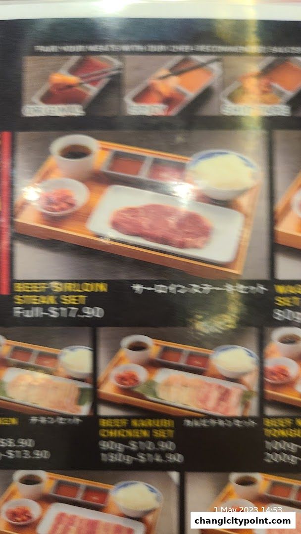 A menu display showing various meat sets with prices and images.