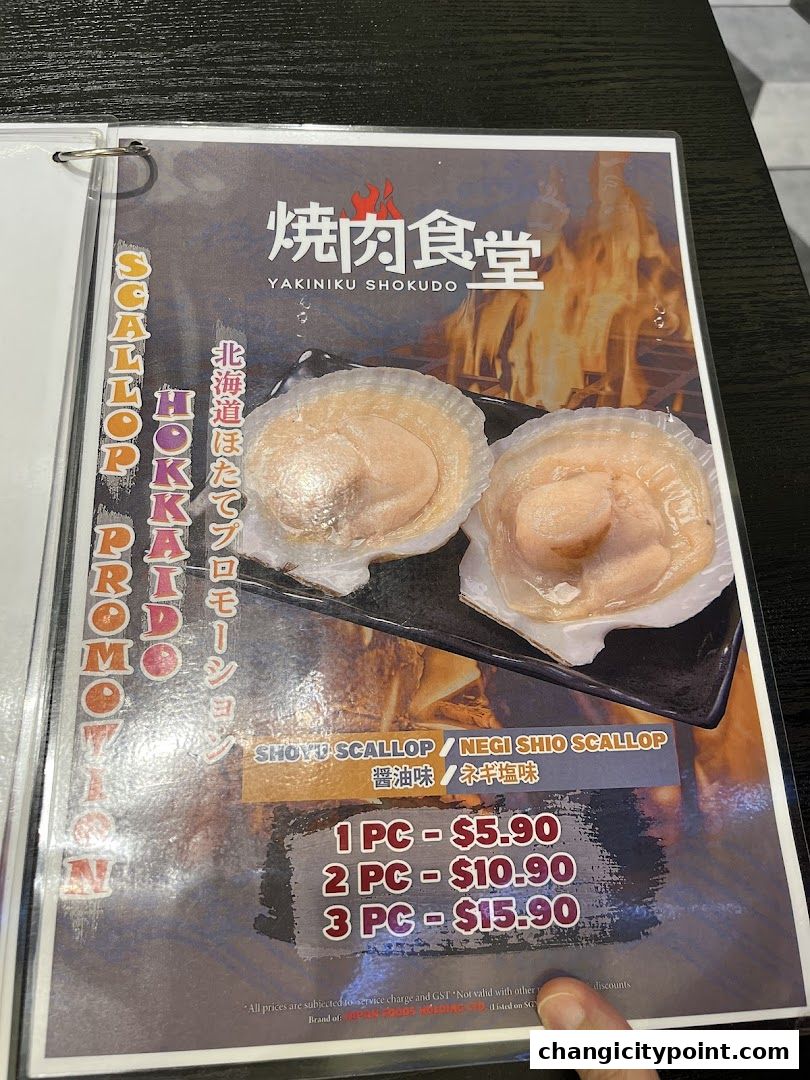 A menu page featuring Hokkaido scallops with Shoyu and Negi Shio flavors.