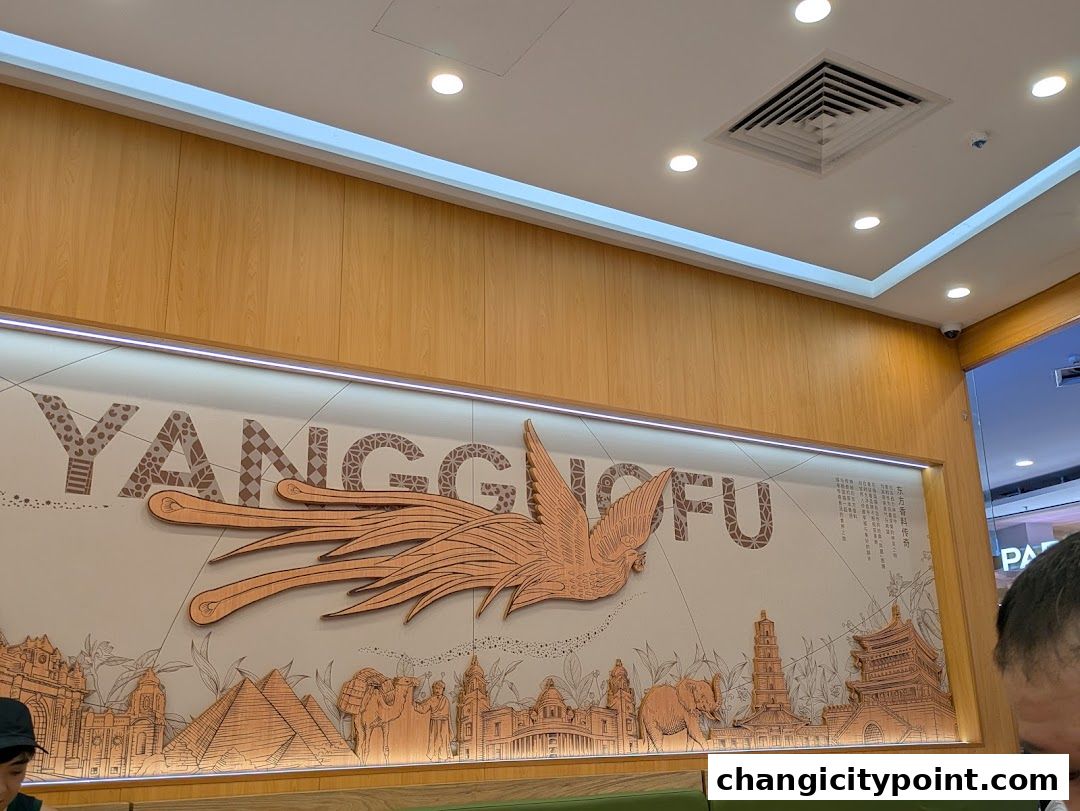Interior shot of Yang Guo Fu Mala Tang with a large decorative mural.